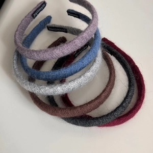 Knitted mohair-style padded headbands in multiple colors with handmade label