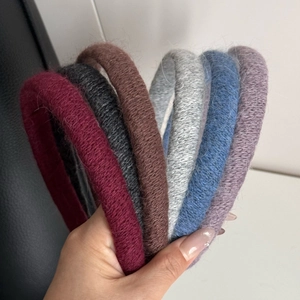 Plush knitted headbands for women in six colors including red, grey, brown and blue