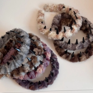 Chic plush headbands with spikes in various colors for a non-slip volumizing hairstyle
