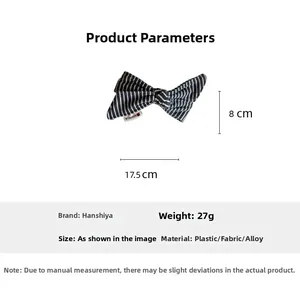 Detailed view of the 17.5cm large striped fabric bow clip with product dimensions