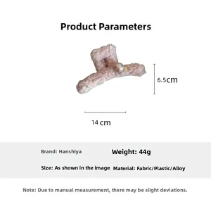 Detailed view of pink plush claw clip with pearl, measuring 14cm long and weighing 44g