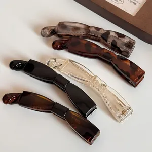 Pince à Cheveux Banane en Résine Élégante Design Nœud Barrette Torsadée pour Femme Support de Queue de Cheval Accessoires de Coiffure