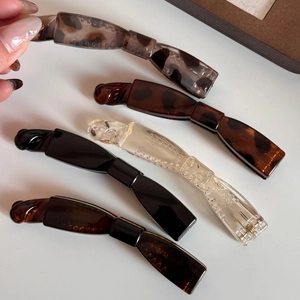 Pinces à cheveux banane nœud en résine minimalistes en écaille, ambre et noir