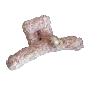 Pink plush hair claw clip with large pearl and golden heart accent for women