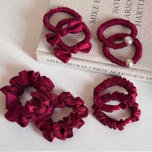Elegant burgundy silk satin hair scrunchies set with bow and bead details for women
