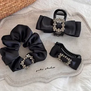 Elegant 3-piece set of black satin hair accessories with square rhinestone bow designs