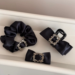 Three-piece black satin hair accessory set with square rhinestone bow clips and scrunchie