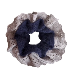 Dual-layer scrunchie with navy blue knit fabric and grey lace floral embroidery