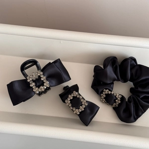 Detailed set of three black satin hair accessories with sparkling square rhinestone buckles