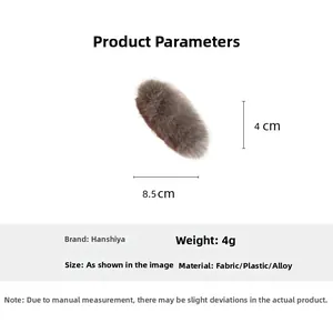 Detail view of brown plush hair clip showing dimensions 8.5x4cm and soft fuzzy texture