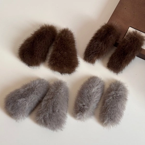 Plush faux fur hair clips set in brown and grey-purple colors with a soft triangular design