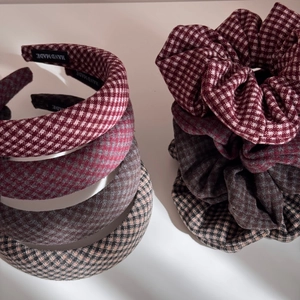 Detail of handmade padded plaid headbands and matching scrunchies in winter fabric