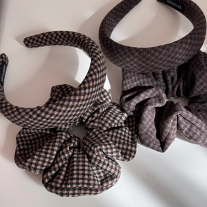 Detail view of plaid sponge headband and matching scrunchie set in vintage houndstooth fabric