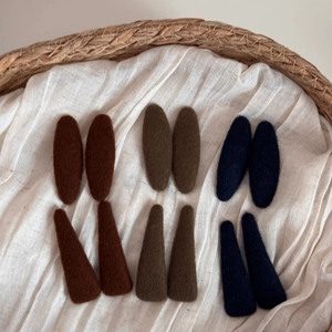 Set of felt-textured snap hair clips in dark brown, olive green and navy blue colors