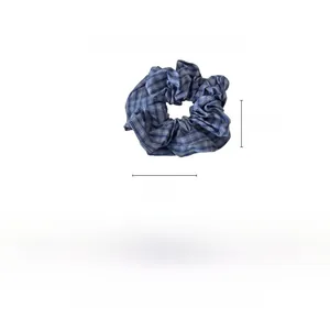 Blue-grey plaid fabric scrunchie detail showing 12cm size and 12.3g weight parameters