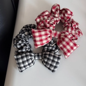 Classic checkered bow hair scrunchies in black and white and red and white cotton patterns