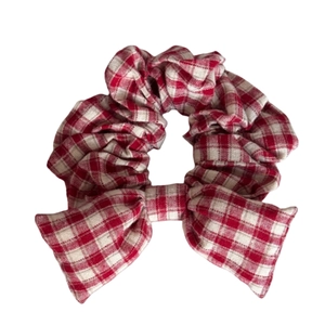 Minimalist red and white checkered bow scrunchie made of premium cotton fabric