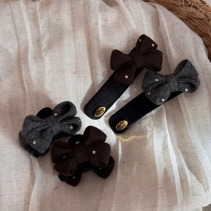 Detailed set of 4 knitted bow hair clips with silver rhinestones and gold handmade tags