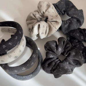 Detailed set of floral hair scrunchies and padded headbands in elegant neutral tones
