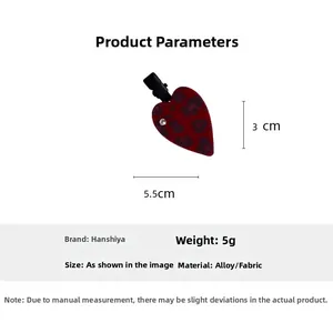 Detail view showing red leopard print heart hair clip with dimensions 5.5cm x 3cm