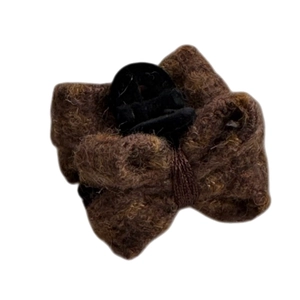 Plush brown wool bow hair claw clip for elegant autumn and winter hairstyles