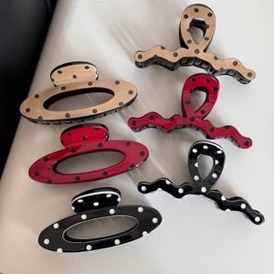 Polka dot hair claw clip set with elegant wave and oval shapes for women hair styling