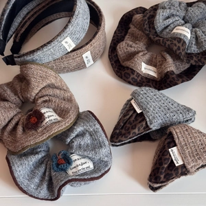 Winter leopard knit scrunchies and headbands with handmade floral detail and woven label