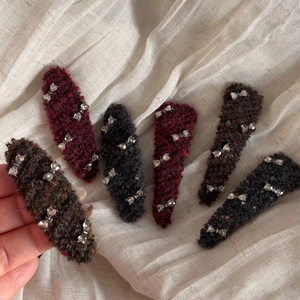 Set of six plush bow hair clips in wine red, black and brown with rhinestone accents