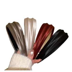 Luxurious padded satin headbands in wine red and champagne colors for voluminous hairstyle
