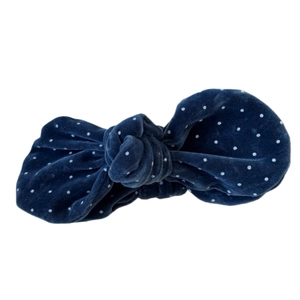Elegant navy blue velvet polka dot banana hair clip with a stylish knotted design