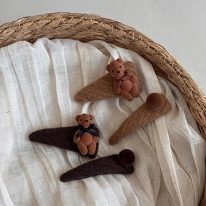 Cute set of four triangular flocked bear hair clips in brown tones for autumn and winter