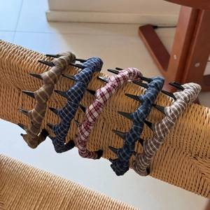 Set of five plaid fabric headbands with teeth combs in various colors for hair styling