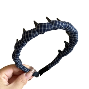 Dark blue checkered headband with black gothic spikes for punk style hair accessory
