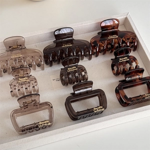 Elegant tortoiseshell and amber hair claw clips set in various minimalist shapes