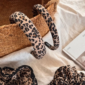 Handmade leopard print headband and scrunchie set made of soft fabric in retro style