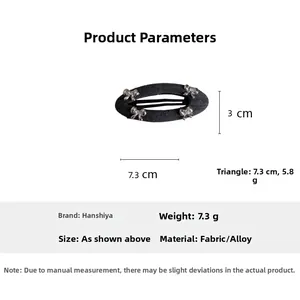 Detailed size parameters of the gray fabric oval hair clip with silver bows decoration