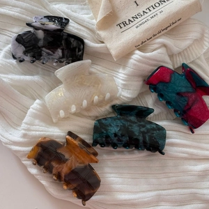 Elegant medium acetate hair claw clips with marble and tortoiseshell patterns set of five