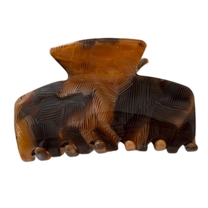 Elegant medium acetate hair claw clip with coffee amber texture on a white background