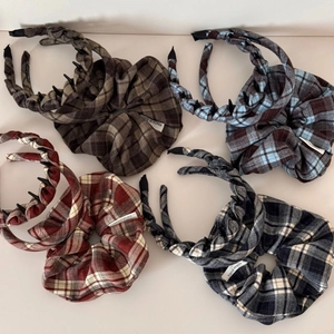 Detail of British style plaid fabric headband and large scrunchie set in assorted colors