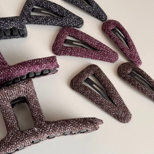 Elegant knitted fabric shark hair clips in grey, burgundy, and brown for autumn style