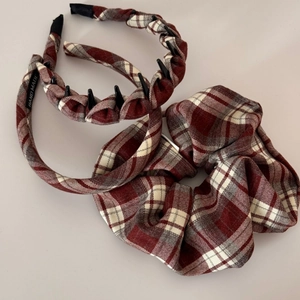 Detail of red and white plaid scrunchies and headbands set with high elastic core