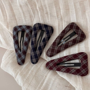 Set of four geometric triangle BB clips in dark plaid wool fabric for elegant hair styling
