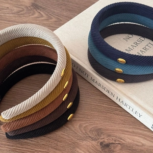 Elegant ribbed fabric headbands with gold Korea metal oval tags in multiple colors