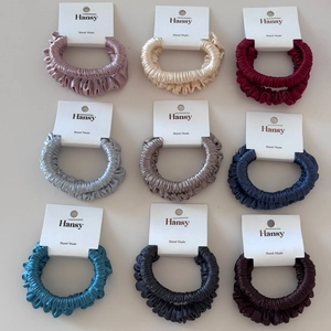 9-piece set of elegant satin hair scrunchies in assorted colors with silk gloss finish