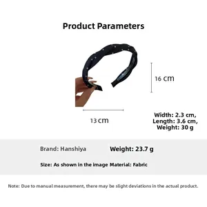Detailed size specifications and weight of the polka dot headband with fabric texture