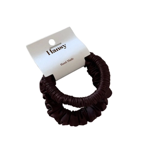 Set of 2 dark brown satin hair scrunchies with silky gloss on white display card