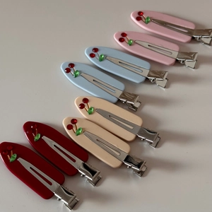 French vintage cherry rhinestone hair clips in four colors on a minimal white background