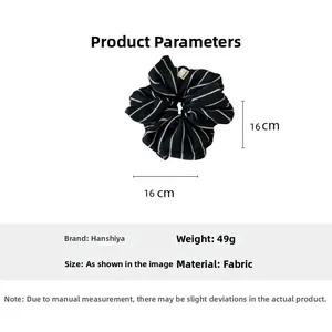 Detail view of large striped fabric hair scrunchie with 16cm diameter and 49g weight