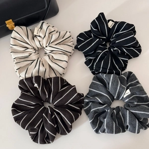 Striped knit scrunchies set in cream, black, coffee, and grey with Hand Made tags