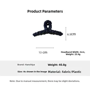Detail view of navy blue fabric hair claw clip with 13cm length and 6.5cm height